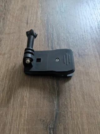 Pinza para cámara de acción