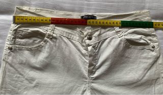 Pantaloni cotone bianchi con zip fondo gamba