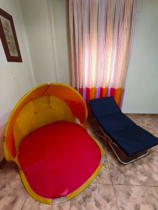 Hamaca de tela y metal naranja