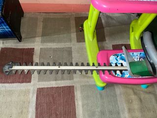 Corta setos eléctrico verde