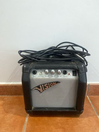 Guitarra eléctrica VISION ST-4B 3/4 y amplificador