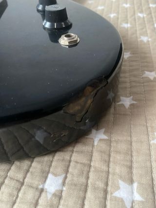 Guitarra eléctrica VISION ST-4B 3/4 y amplificador