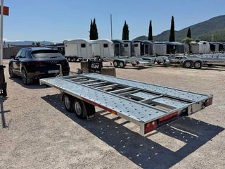 TRANSPORTE DE REMOLQUES, COCHES Y CARAVANAS