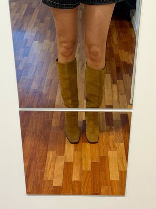 Botas altas ante Zara