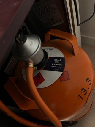 Estufa de butano con piedras