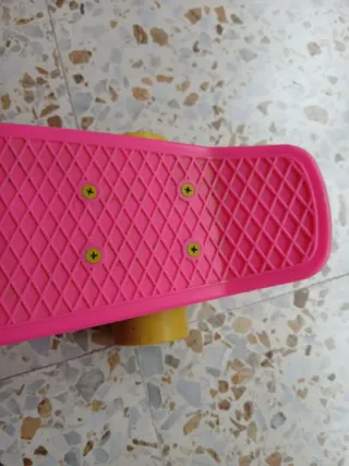 Monopatín rosa