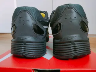 Nike P-6000 Negro/Gris/Amarillo