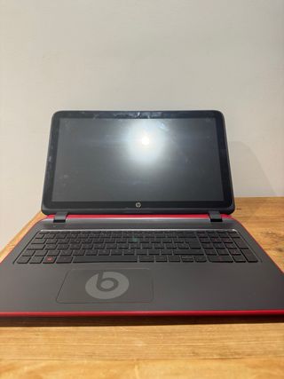 HP X BEATS portátil negro y rojo