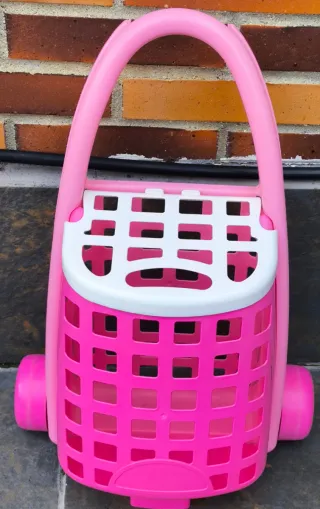Carrito de la compra de juguete rosa