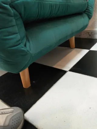 Sofá cama verde de terciopelo