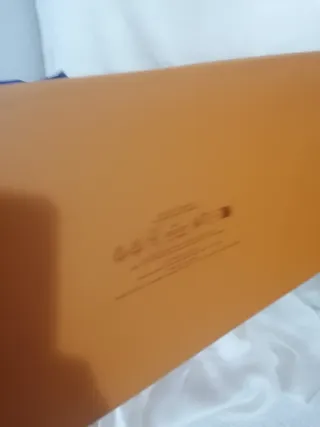 Busta, scatola, nastro e cartellino Louis Vuitton