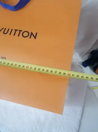 Busta, scatola, nastro e cartellino Louis Vuitton