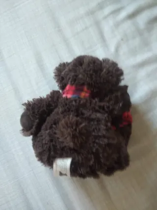 Orsetto peluche marrone con fiocco rosso