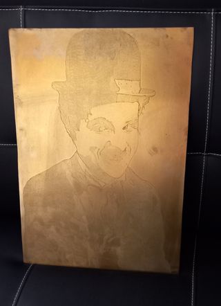 Cuadro cobre tallado