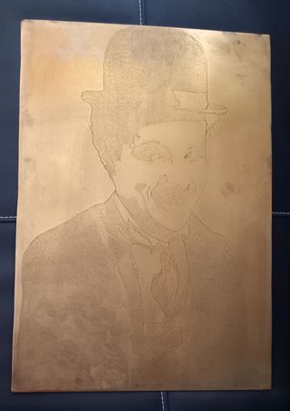 Cuadro cobre tallado