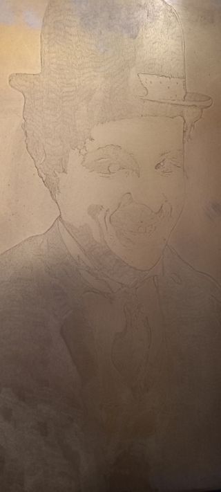 Cuadro cobre tallado