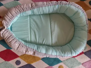 Cojín nidito bebé estrellas y lunas