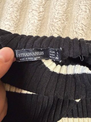 Jersey cuello alto rayas blanco y negro