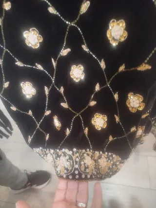 Chaqueta de fiesta negra y dorada