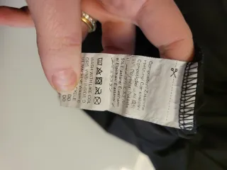 Maglia donna con scollo asimmetrico