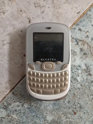 Teléfono Alcatel Gris y Blanco