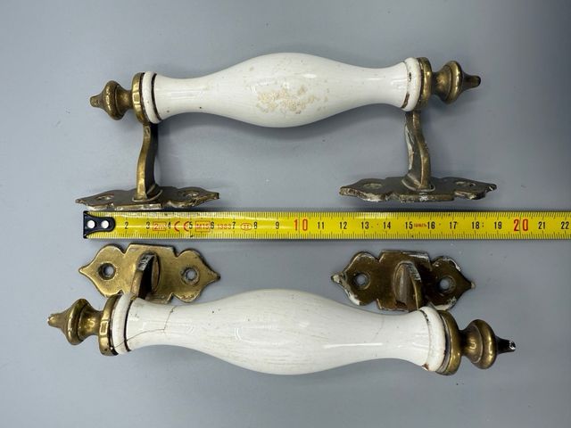 Pareja tiradores antiguos bronce y porcelana