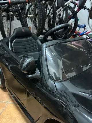 Coche eléctrico infantil negro