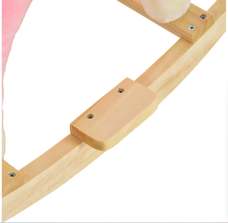 Caballo balancín HOMCOM rosa con música