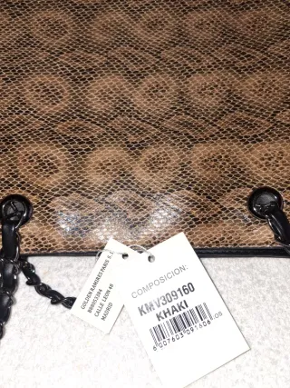 Bolso de hombro estampado serpiente. Con etiquetas