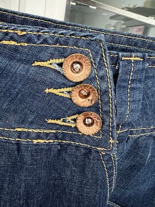 Falda vaquera botones dorados