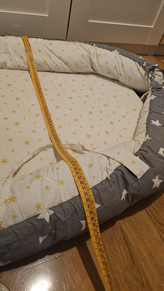 Cojín nido para bebé estrellas