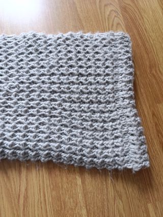 Bufanda gris redonda