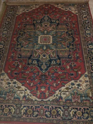 Alfombra de lana azul y roja