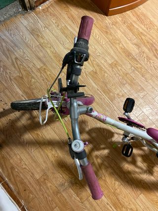 Bicicleta infantil Btwin rosa y blanca