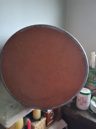 Antiguo bidón de cartón piedra