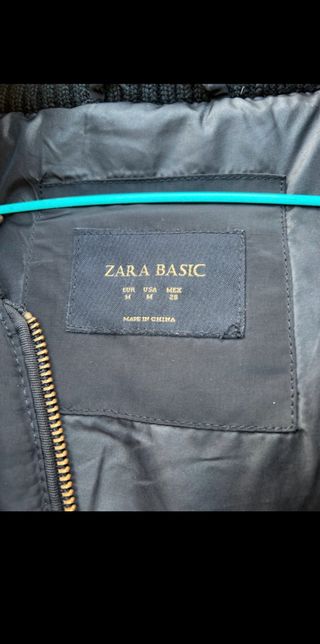 Plumas negro Zara con capucha