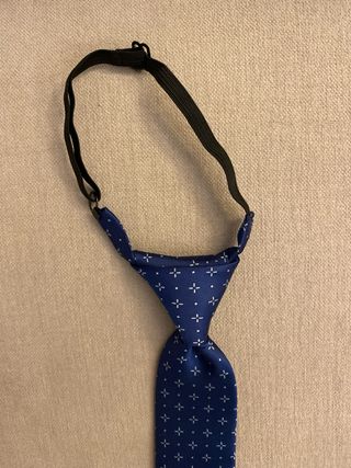 Corbata niño comunión azul marca COCONUT .