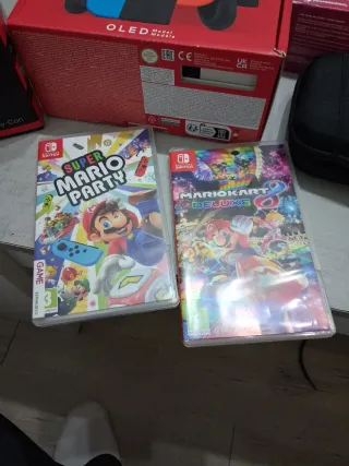 Nintendo Switch OLED + 2 Juegos + Nitro Deck