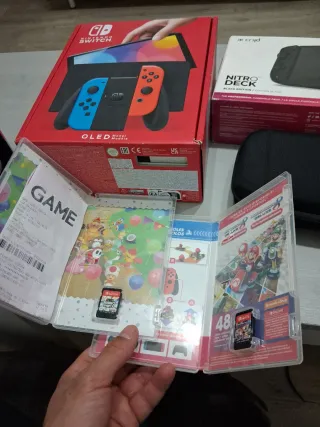 Nintendo Switch OLED + 2 Juegos + Nitro Deck