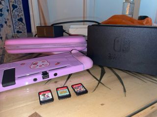 Nintendo Switch Rosa + Funda + 3 Juegos