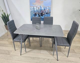 Mesa comedor y 4 sillas grises