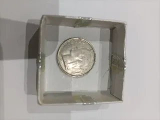 Moneda antigua con agujero , precios negociables