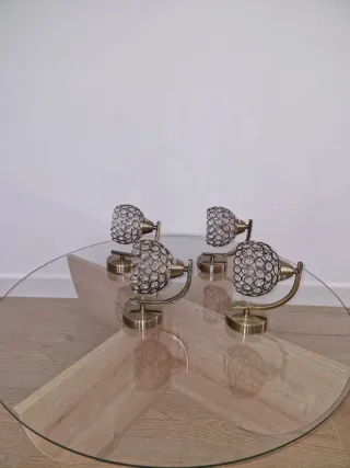 Conjunto 4 apliques pared dorados con cristales.