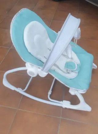 Hamaquita bebé con arco de juegos