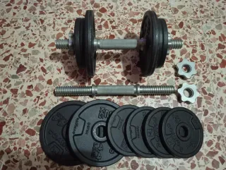 Banco de entrenamiento mas juego de pesas.