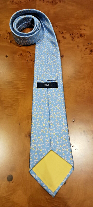 CORBATA IDAS, SEDA NATURAL, AZUL DETALLE FRUTAL.