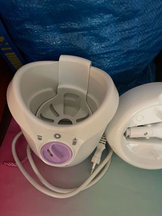 Calienta biberones Chicco para coche