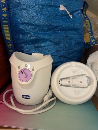 Calienta biberones Chicco para coche