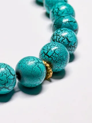 Collana girocollo con grani turchesi