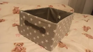 Caja rectangular forrada de tela gris